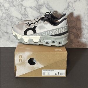 Women’s ON Cloudmonster Hyper gray and black sneakers